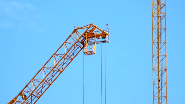 Large Construction Site Several Busy Cranes Dusk Clear Blue Sky — Video Stock