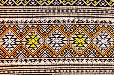 Renkli Tay el sanatları Perulu stil halı yüzeye yakın çekim. Bu motifi ve daha fazla Tekstil, daha fazla Perulu şerit güzel arka plan Goblen Farsça göçebe ayrıntı desen Arapça moda Tekstil.        