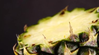 4K Phuket pineapple sliced pieces of delicious pineapple fruit Tropical food Rotate isolated on black background