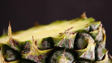 4K Phuket pineapple sliced pieces of delicious pineapple fruit Tropical food Rotate isolated on black background