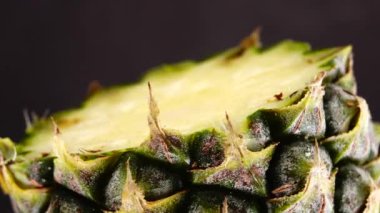 4K Phuket pineapple sliced pieces of delicious pineapple fruit Tropical food Rotate isolated on black background