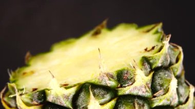 4K Phuket pineapple sliced pieces of delicious pineapple fruit Tropical food Rotate isolated on black background