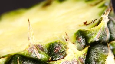 4K Phuket pineapple sliced pieces of delicious pineapple fruit Tropical food Rotate isolated on black background