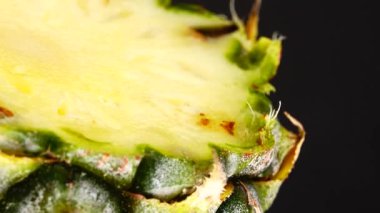 4K Phuket pineapple sliced pieces of delicious pineapple fruit Tropical food Rotate isolated on black background