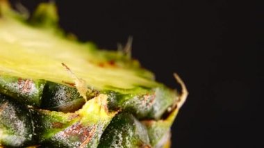 4K Phuket pineapple sliced pieces of delicious pineapple fruit Tropical food Rotate isolated on black background