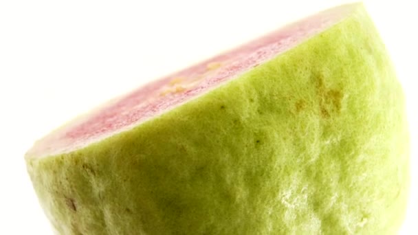 Macro Close Organic Sliced Guava Rotating Plate Isolated White Background — Αρχείο Βίντεο