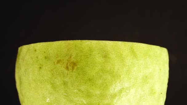 Macro Close Organic Sliced Guava Rotating Plate Isolated Black Background — Αρχείο Βίντεο