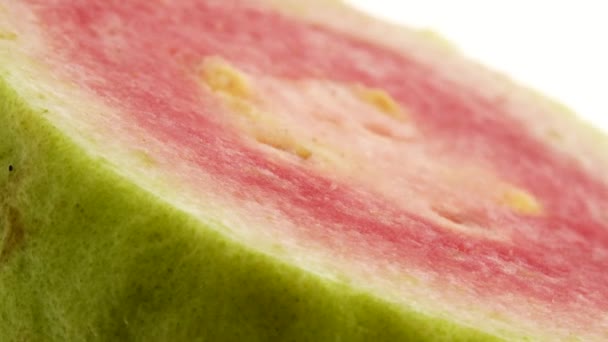 Macro Close Organic Sliced Guava Rotating Plate Isolated White Background — Wideo stockowe