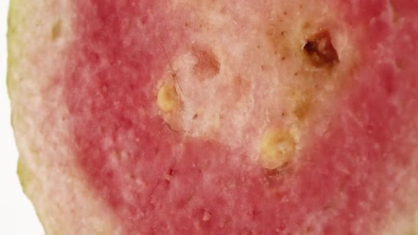 Macro Close Organic Sliced Guava Rotating Plate Isolated Black Background — Video Stock