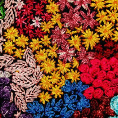 Colorful thai handcraft Kosher style rug surface old vintage torn conservation Made from natural materials Chemical free close up.