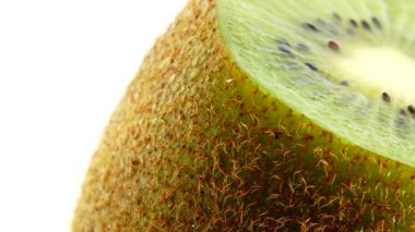  4K kiwi fruit. heap sliced and whole kiwi fruit close up, rotating