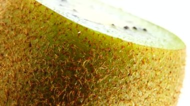  4K kiwi fruit. heap sliced and whole kiwi fruit close up, rotating