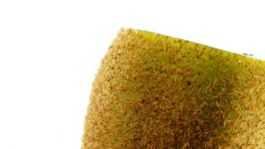  4K kiwi fruit. heap sliced and whole kiwi fruit close up, rotating