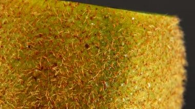  4K kiwi fruit. heap sliced and whole kiwi fruit close up, rotating