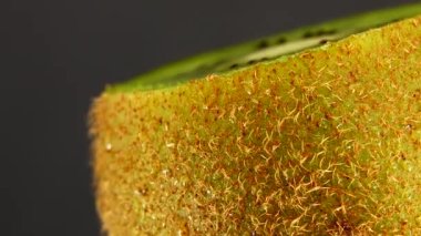 4K kiwi fruit. heap sliced and whole kiwi fruit close up, rotating