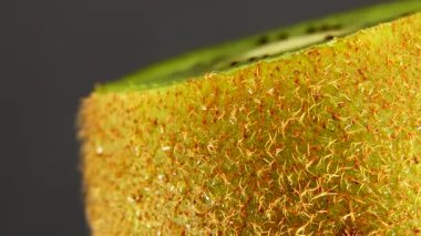  4K kiwi fruit. heap sliced and whole kiwi fruit close up, rotating