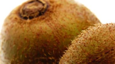  4K kiwi fruit. heap sliced and whole kiwi fruit close up, rotating
