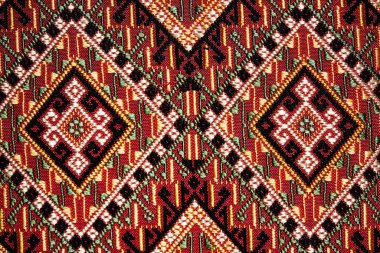 Colorful thai handcraft peruvian style rug surface old vintage torn conservation Made from natural materials Chemical free  close up