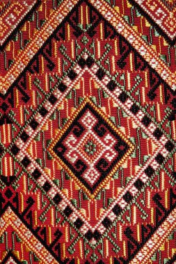 Colorful thai handcraft peruvian style rug surface old vintage torn conservation Made from natural materials Chemical free  close up