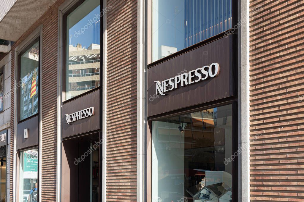VALENCIA, SPAIN - OCTOBER 26, 2021: Nespresso is an operating unit of the Nestle Group. It sells coffee capsules and coffee machines