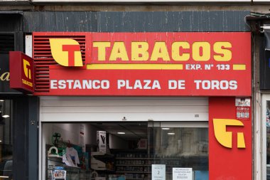 VALENCIA, SPAIN - NOVEMBER 10, 2021: Tobacco and stamps shop in city center clipart