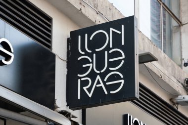 VALENCIA, SPAIN - JANUARY 03, 2022: Llongueras is a Spanish chain of hairdressing salons