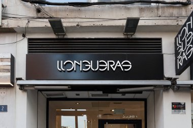 VALENCIA, SPAIN - JANUARY 03, 2022: Llongueras is a Spanish chain of hairdressing salons