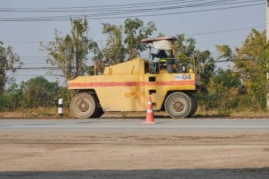Phayao, Tayland - 27 Ocak 2021: Asfalt Yolu 'nda Çalışan Beş Tekerlekli Paten