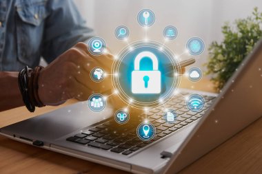 Casual Businessman Hand Touching Mobile Phone or Smart Phone Screen and Blue Circle Lock Security Sign and Laptop Computer. Secure or Firewall and Protection Concept