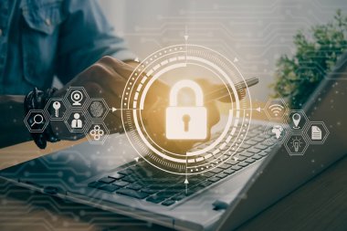 Casual Businessman Hand Touching Mobile Phone or Smart Phone Screen and Lock Security Sign and Laptop Computer. Secure or Firewall and Protection Concept in Vintage Tone