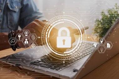 Casual Businessman Hand Touching Mobile Phone or Smart Phone Screen and Lock Security Sign and Laptop Computer. Secure or Firewall and Protection Concept