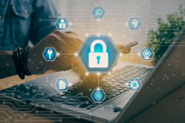 Casual Businessman Hand Touching Mobile Phone or Smart Phone Screen and Blue Center Hexagon Lock Security Sign and Laptop Computer. Secure or Firewall and Protection Concept in Vintage Tone