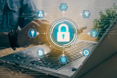 Casual Businessman Hand Touching Mobile Phone or Smart Phone Screen and Blue Hexagon Lock Security Sign and Laptop Computer. Secure or Firewall and Protection Concept in Vintage Tone