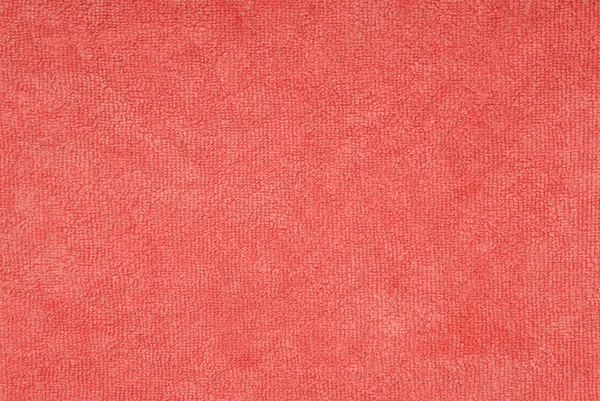 It is a closeup of soft coral fabric. — Stock Photo, Image