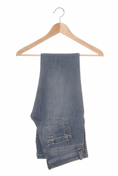 A blue jeans are on hanger. — Stock Photo, Image