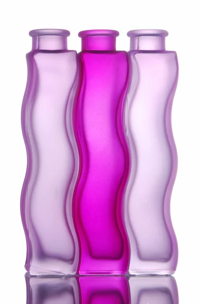 Lilac glassy vases are on white background. — Stock Photo, Image