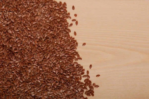 Flax-seed on table — Stock Photo, Image