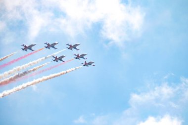 ISTANBUL, TURKEY, SEPTEMBER 19, 2019: Canadair NF5 demonstration jets of Turkish Stars on air above Ataturk Airport for Teknofest 2019 Airshow. Turkish Stars, the national aerobatics team of Turkey.