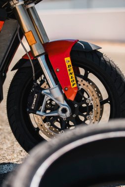 Almeria, Spain - May 4th 2021: Close up view of BMW motorbike with Dunlop sticker and tyre, during Dunlop Xperience showroom and test in Almeria, Spain.