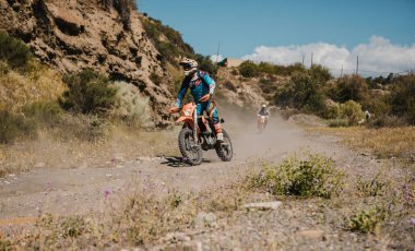 Almeria, Spain - May 5th 2021: Motocross riders riding in nature during Dunlop Xperience showroom and test in Almeria, Spain.