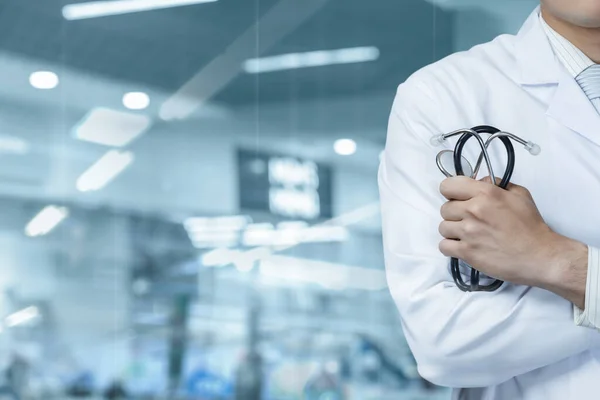 Doctor Stethoscope His Hands Blurred Blue Background —  Fotos de Stock