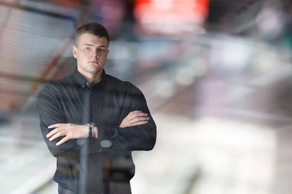 Young Businessman Standing His Arms Crossed Blurred Background — Fotografia de Stock