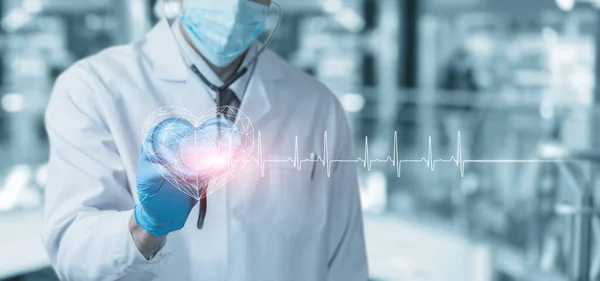 Doctor Listens Heart Pulse Blurred Background —  Fotos de Stock