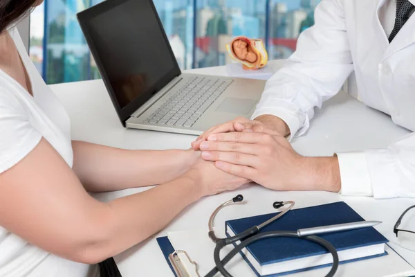 Doctor Supports Patient His Hands Office Table —  Fotos de Stock