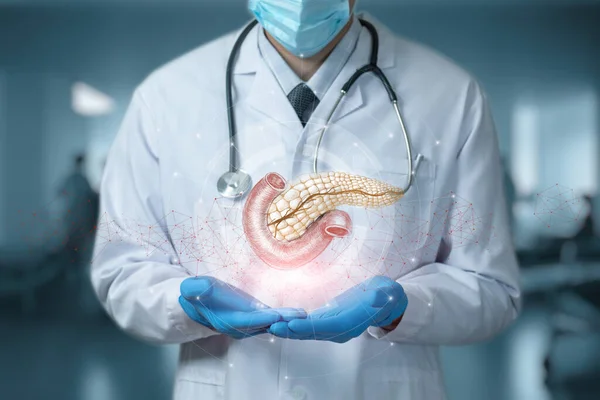 Doktor Pankreası Hastanede Bulanık Bir Zeminde Gösteriyor — Stok fotoğraf