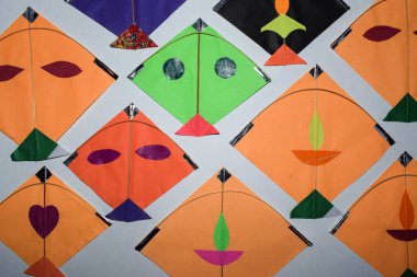 Multicolor Kites display on White background with blank space to write wishes and text. Happy sankranti greetings images background