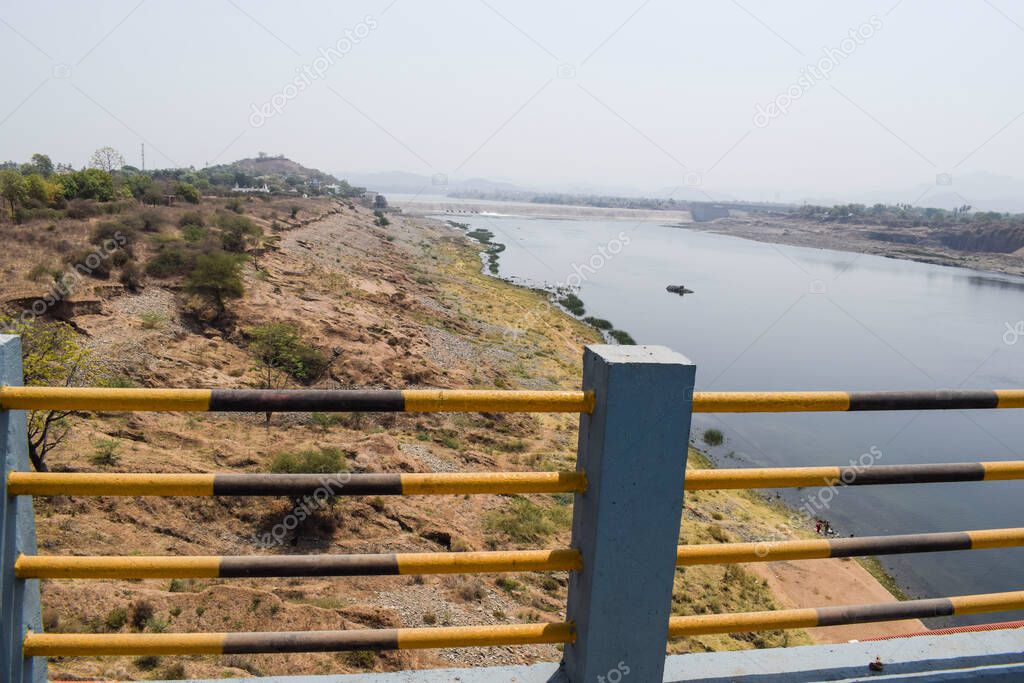 Bridge road pull over river in India. Indian national highway bridge narmada river.