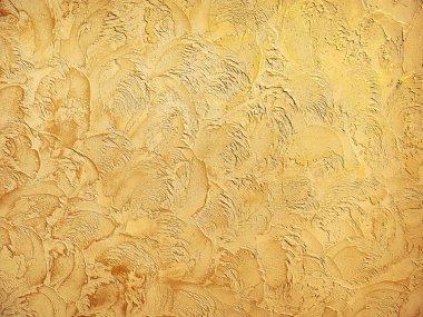 Kalıplı alçı, tasarım için kaba altın arka plan. Metin için alanı olan soyut arkaplan