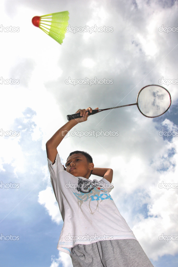 sport asian boy with badminton
