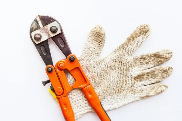 Schraubenschlüssel und Handschuhe — Stockfoto